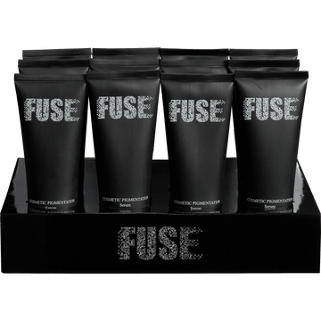 Fuse Cosmetic Pigmentation Serum, Scalp Micropigmentation Aftercare products displayed on a retail stand, promoting SMP lotion and scalp anti shine benefits.
